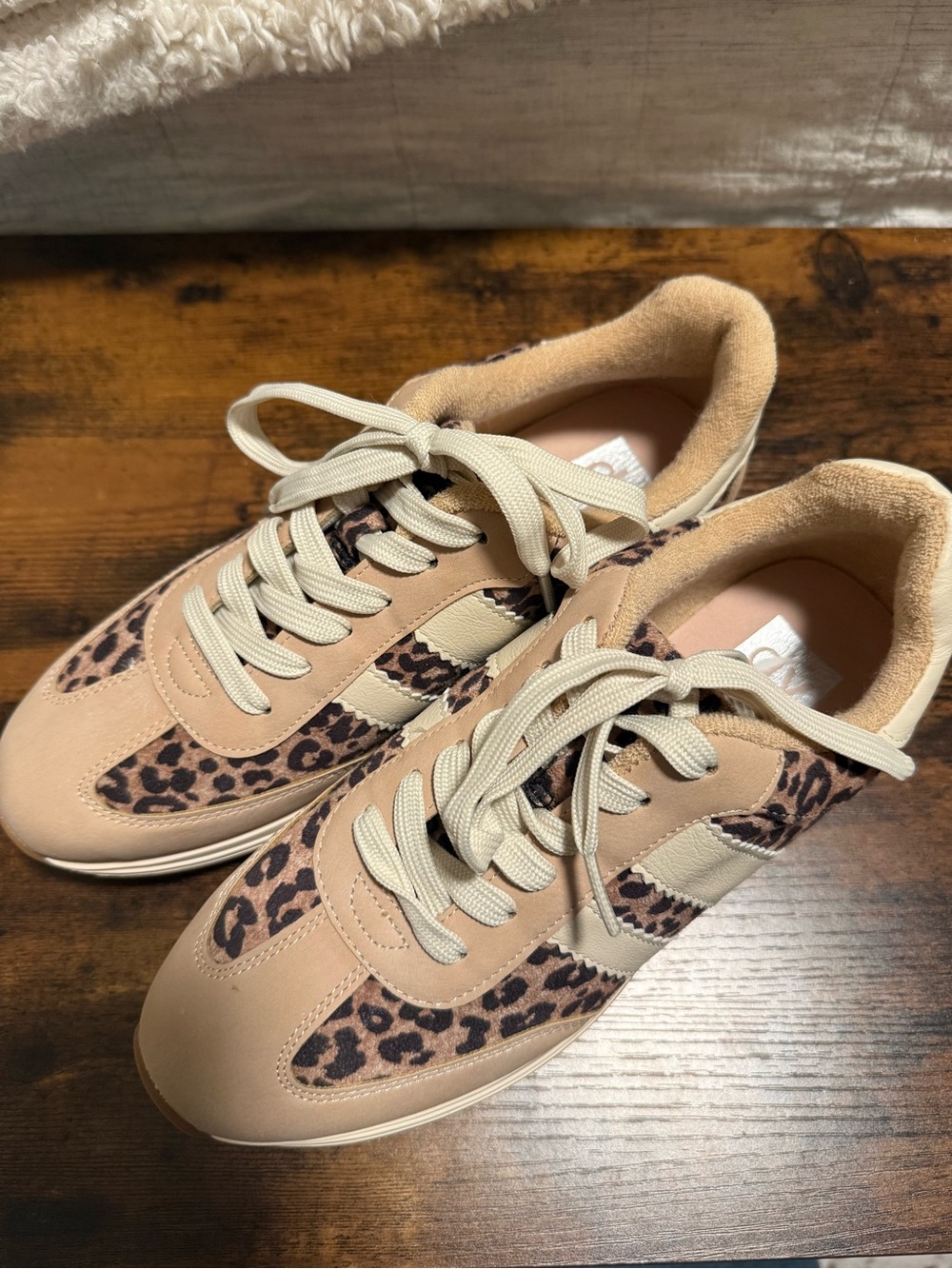 Dolce Vita tan and leopard print sneakers